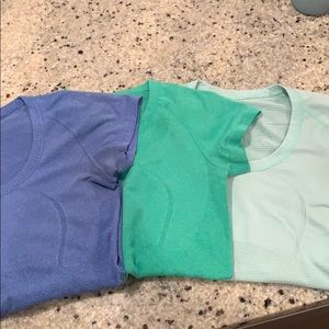3 Lululemon t-shirts.
